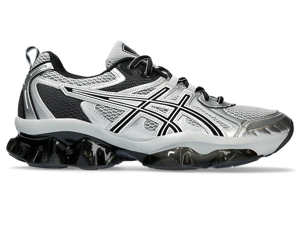 ASICS GEL-QUANTUM KINETIC™ sneaker showcasing a layered upper with synthetic leathers and mesh panels, and a midsole with Scutoid GEL™ technology for enhanced comfort and shock absorption.