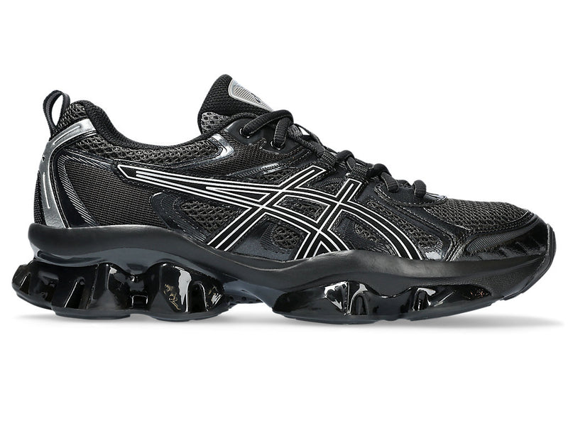 ASICS GEL-QUANTUM KINETIC™ sneaker showcasing a layered upper with synthetic leathers and mesh panels, and a midsole with Scutoid GEL™ technology for enhanced comfort and shock absorption.