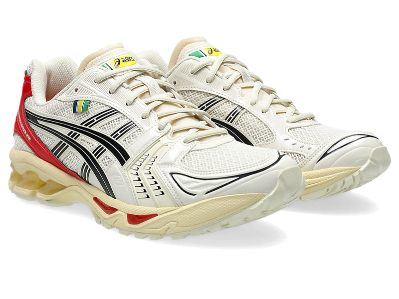 Ayrton Senna-inspired sneakers with red, white, and black design, featuring Japanese text "Ayrton Senna" on the heel, reminiscent of the Marlboro McLaren livery.


