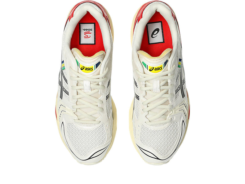 Ayrton Senna-inspired sneakers with red, white, and black design, featuring Japanese text "Ayrton Senna" on the heel, reminiscent of the Marlboro McLaren livery.


