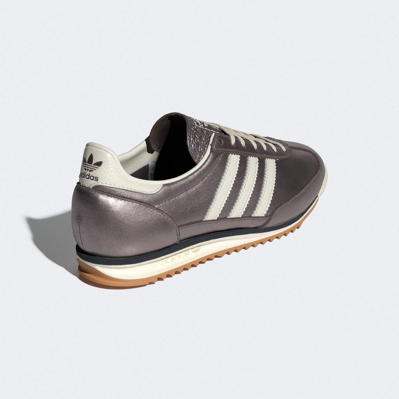 adidas SL 72 sneaker with a metallic leather upper, low-profile silhouette, and EVA midsole for lightweight comfort and vintage-inspired style.