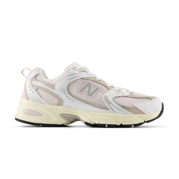 New Balance 530 sneaker with ABZORB midsole, mesh and synthetic upper, and modern design featuring sweeping curves and sharp angles.