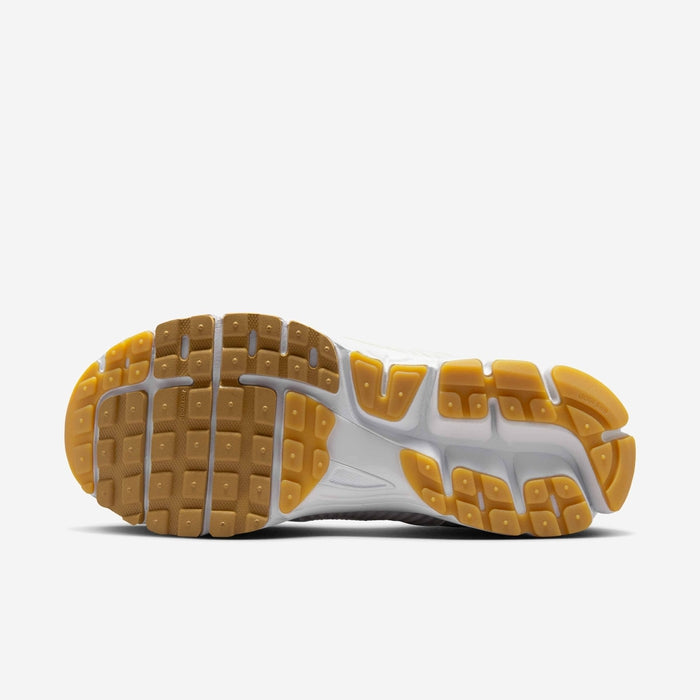 Nike Zoom Vomero 5 sneaker with layered textile and synthetic leather upper in a modern streetwear design