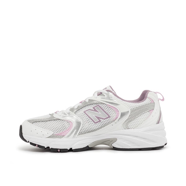 New Balance 530 sneaker with ABZORB midsole, mesh and synthetic upper, and modern design featuring sweeping curves and sharp angles.