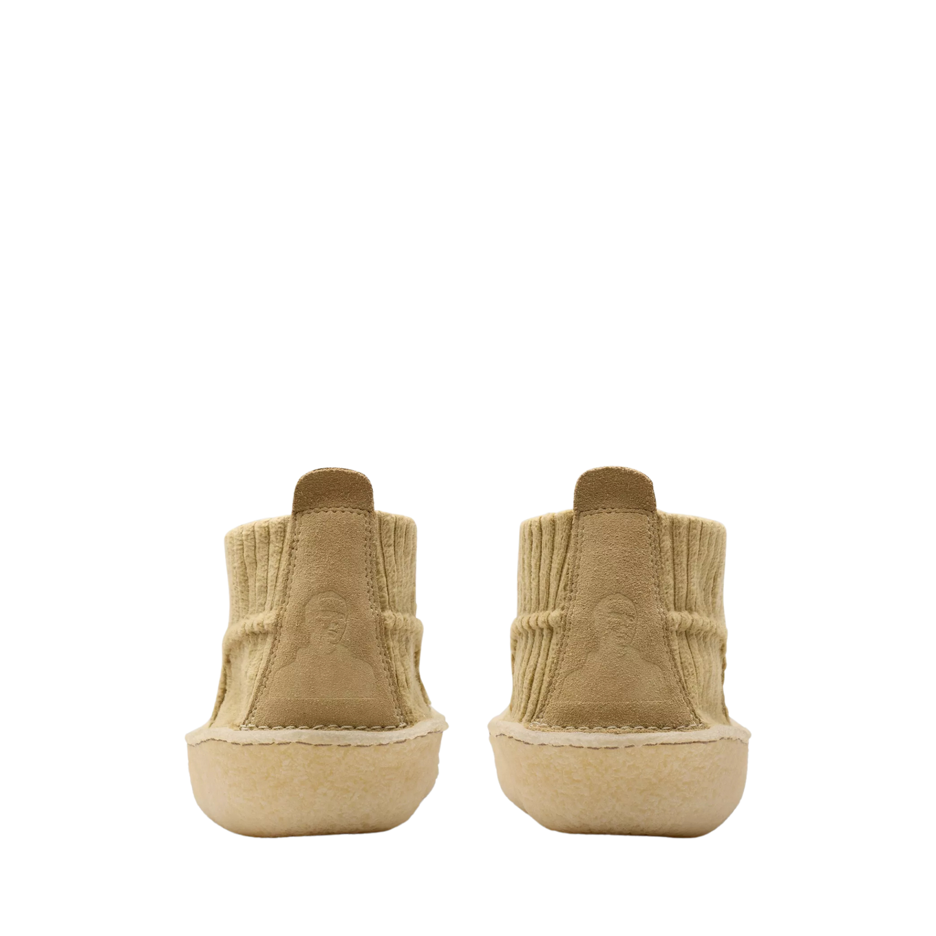 Clarks Originals shoe with premium maple cord upper, round tonal laces, metallic logo, and natural crepe sole wrapping heel and toe.