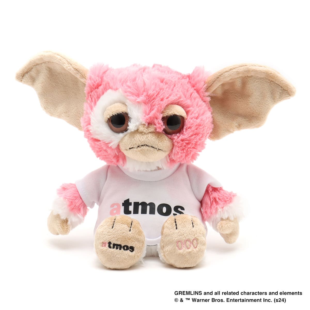 Limited edition Gizmo plush from GREMLINS, featuring atmos brand colors, removable T-shirt, embroidered logos, and serial number, celebrating the 40th anniversary of the film.


