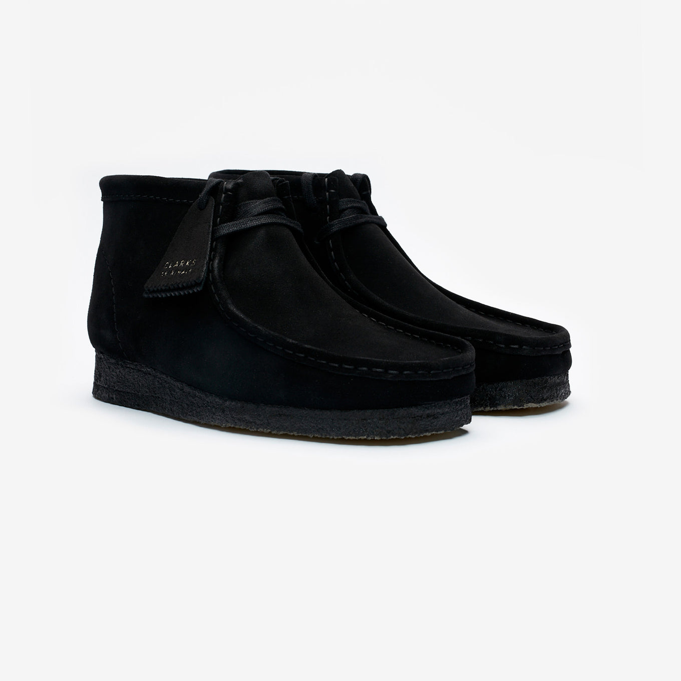 Clarks Wallabee in black suede with a structured moccasin design and signature crepe sole.


