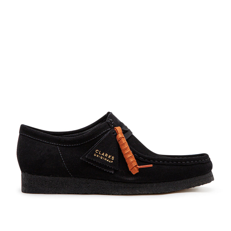 Clarks Wallabee in black suede with a structured moccasin design and lace-up closure.


