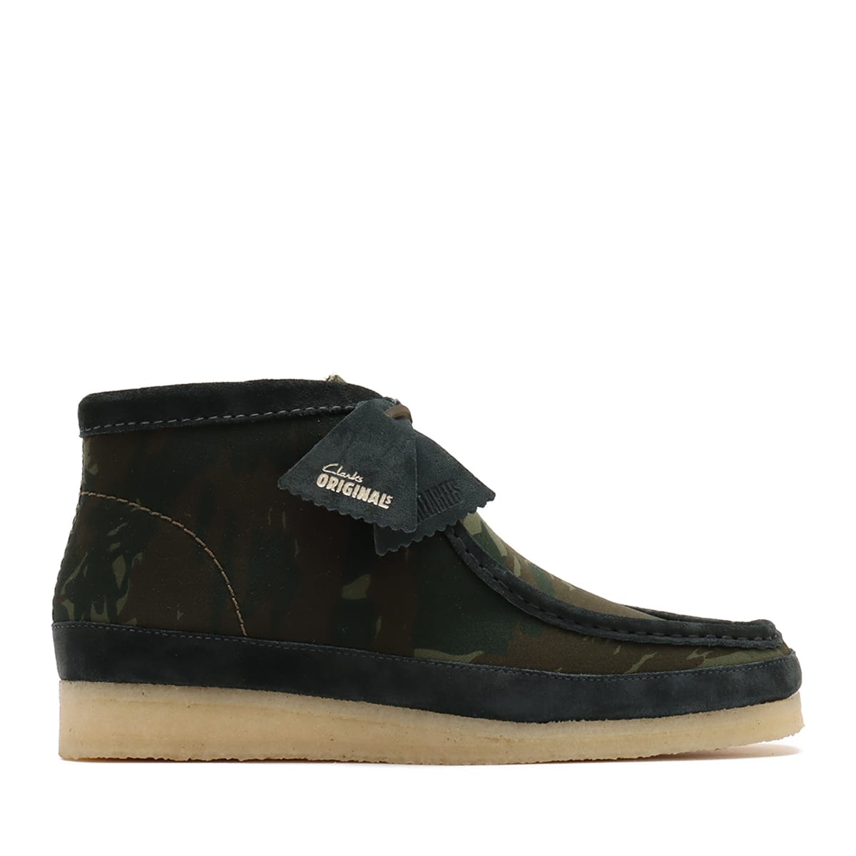 Clarks Wallabee shoe with lace-up design, round toe, and signature crepe sole