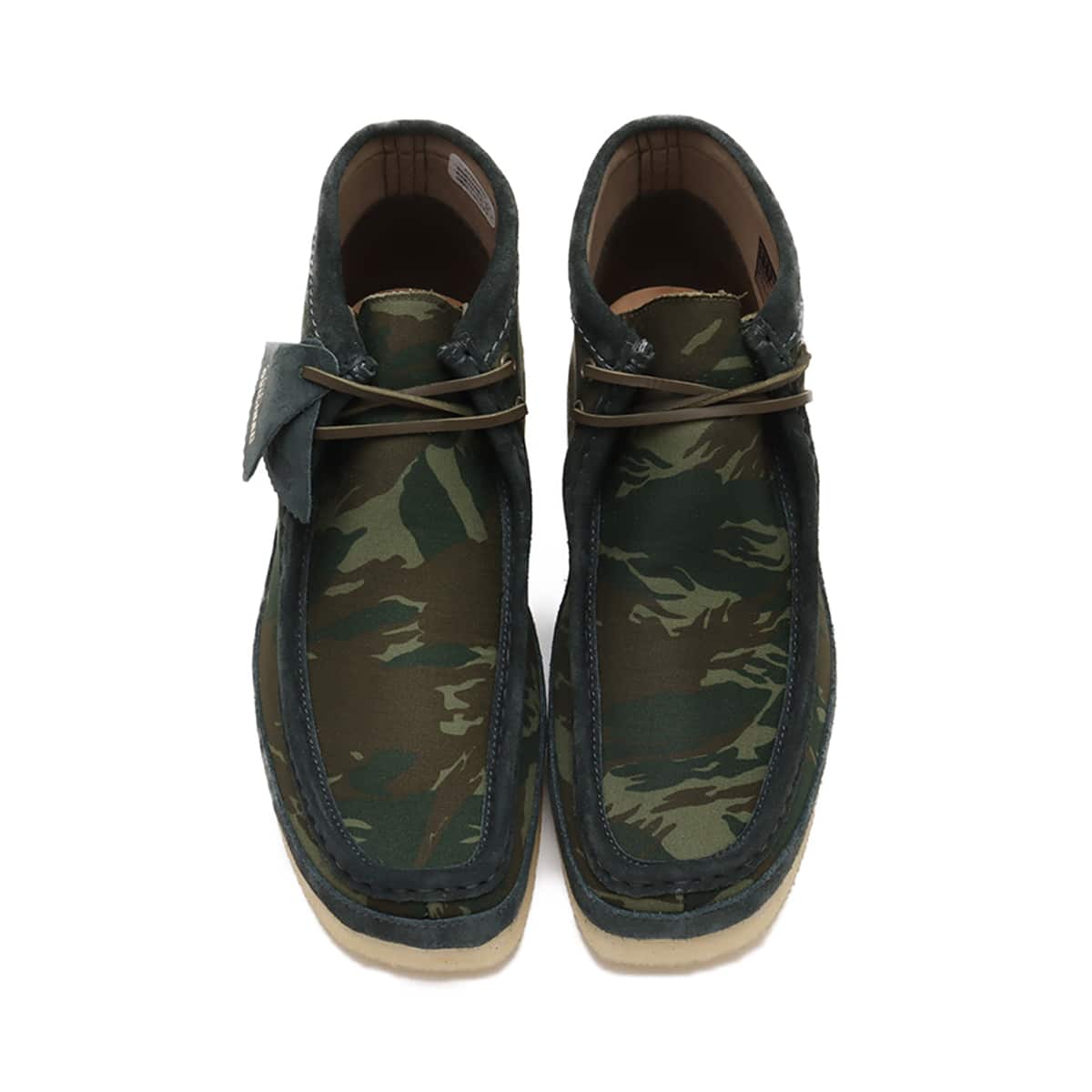 Clarks Wallabee shoe with lace-up design, round toe, and signature crepe sole