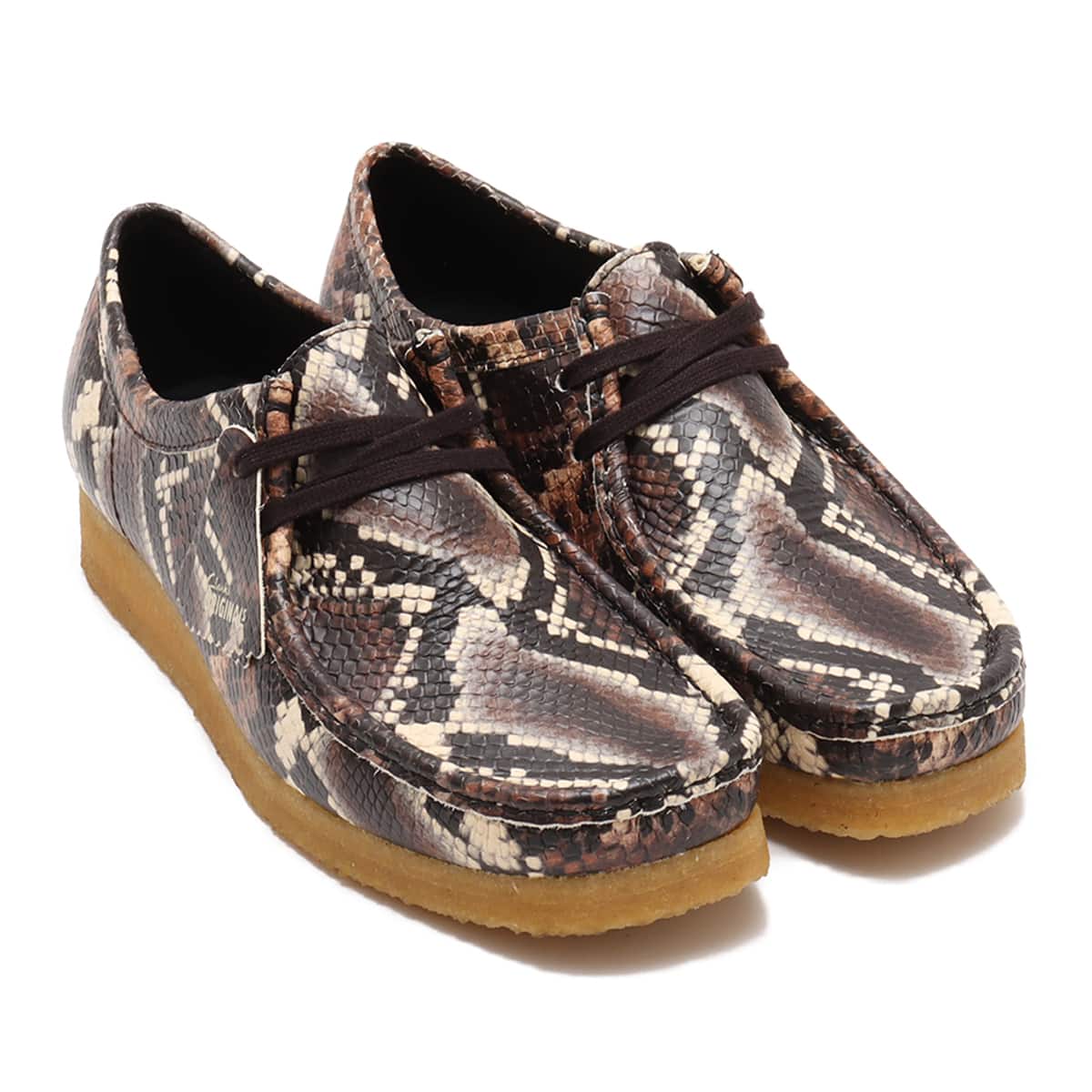 Clarks Wallabee shoe in bold brown snake print with round toe and crepe sole