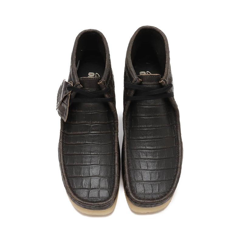 Clarks Wallabee Boot in black crocodile-distressed leather with lace-up closure and crepe sole