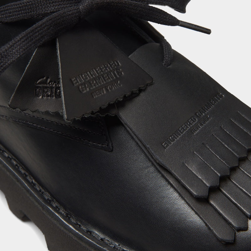 Clarks Originals x Engineered Garments Desert Khan shoes in a reimagined silhouette with modern detailing.