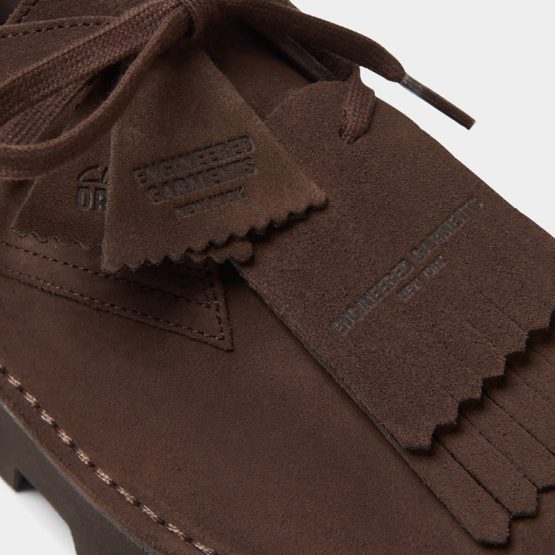 Clarks Originals x Engineered Garments Desert Khan shoes in a reimagined silhouette with modern detailing.
