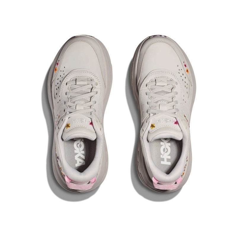 HOKA BONDI L BP lifestyle shoes showcasing vibrant floral patterns, premium nubuck upper, and marbled outsole, designed for both comfort and style.