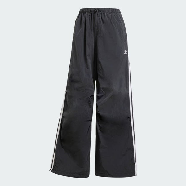 Adidas parachute pants with a relaxed fit and iconic 3-Stripes, designed for comfort and sporty style.