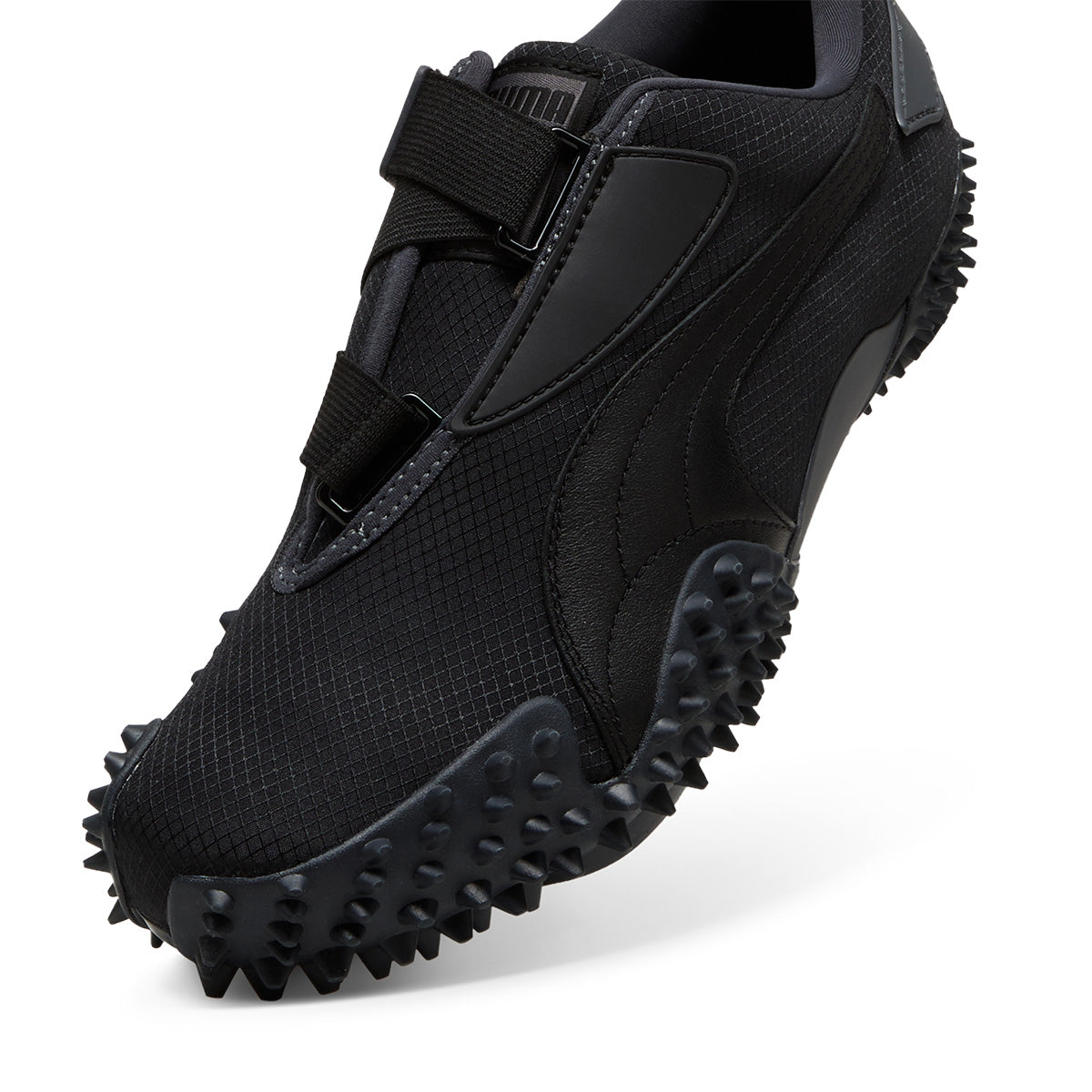 PUMA classic low-profile shoe with spiky sole and hook-and-loop fastener, offering comfort and unique style.