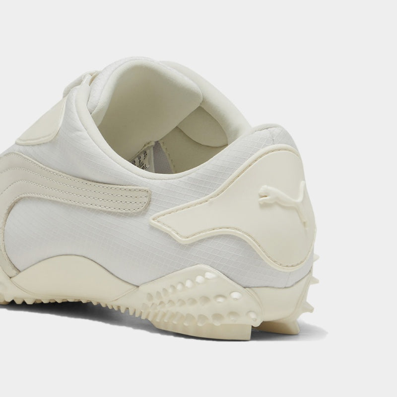 PUMA classic low-profile shoe with spiky sole and hook-and-loop fastener, offering comfort and unique style.