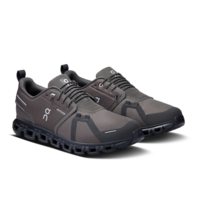 Rain-ready sleek daily shoe with a streamlined silhouette, cushioned comfort, and a waterproof membrane.