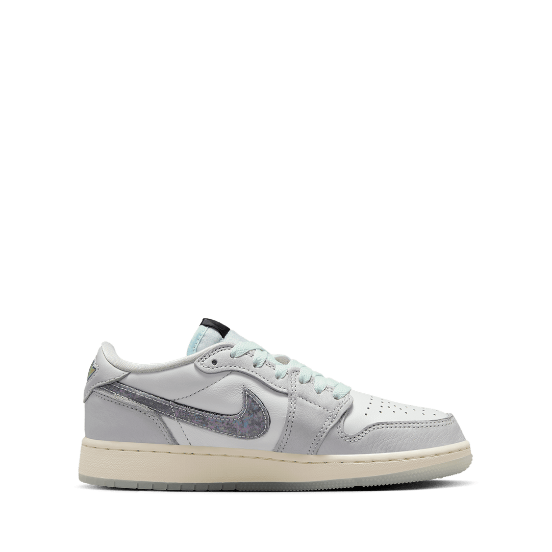 Air Jordan ‘Year of the Snake’ sneaker with reptilian-inspired textures, intricate patterns, and genuine leather for a luxe, commemorative design.