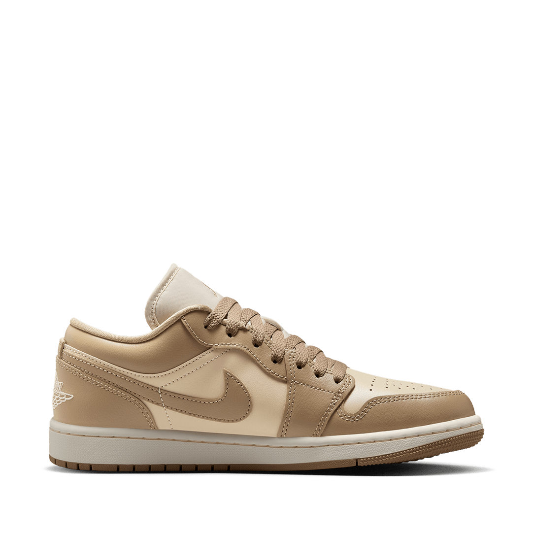Air Jordan 1 Low sneaker with a premium material mix, iconic design, and encapsulated Air cushioning for all-day comfort.