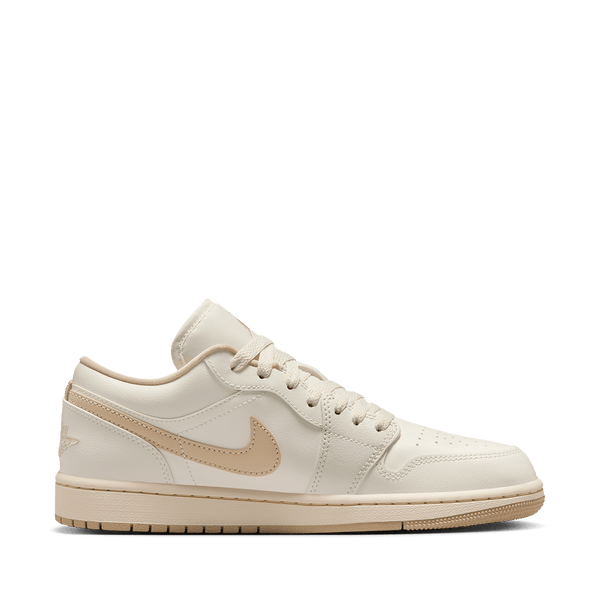 Air Jordan 1 Low sneakers featuring classic silhouette, premium materials, and encapsulated Air unit in the heel.