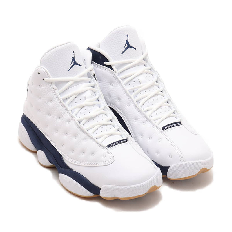 Air Jordan 13 '97-'98 retro in white and Midnight Navy with quilted overlay, sculpted midsole, and holographic eye