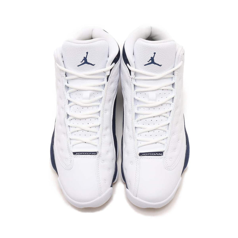 Air Jordan 13 '97-'98 retro in white and Midnight Navy with quilted overlay, sculpted midsole, and holographic eye