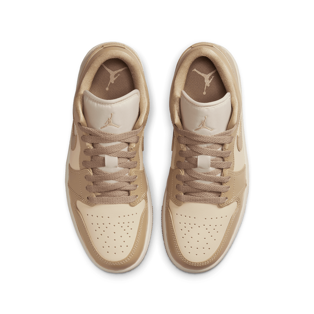 Air Jordan 1 Low sneaker with a premium material mix, iconic design, and encapsulated Air cushioning for all-day comfort.