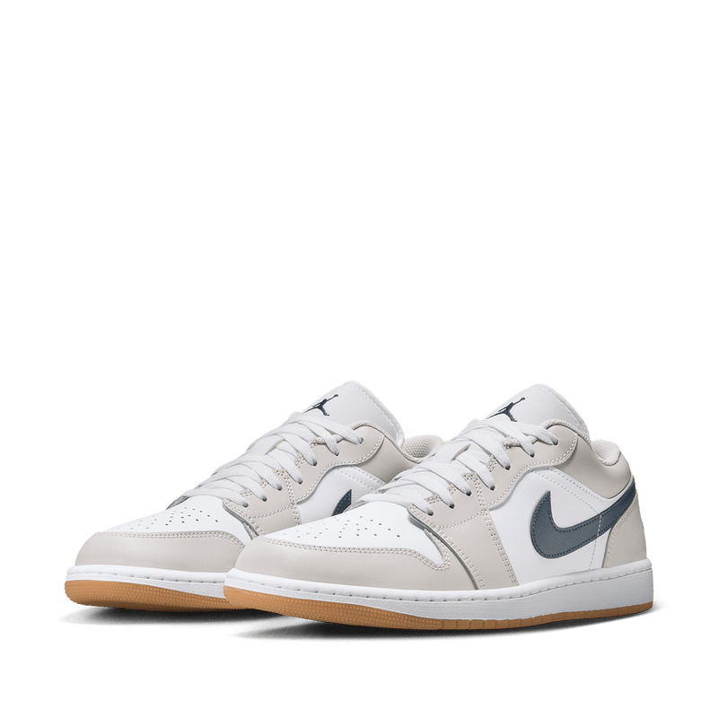 Air Jordan 1 Low sneakers in classic colorway, side profile view.