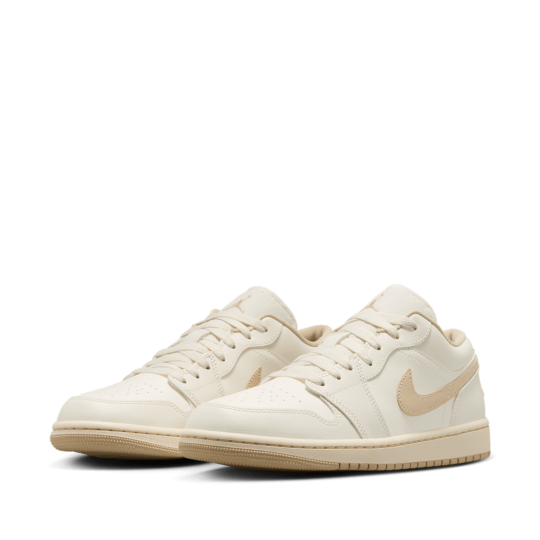 Air Jordan 1 Low sneakers featuring classic silhouette, premium materials, and encapsulated Air unit in the heel.