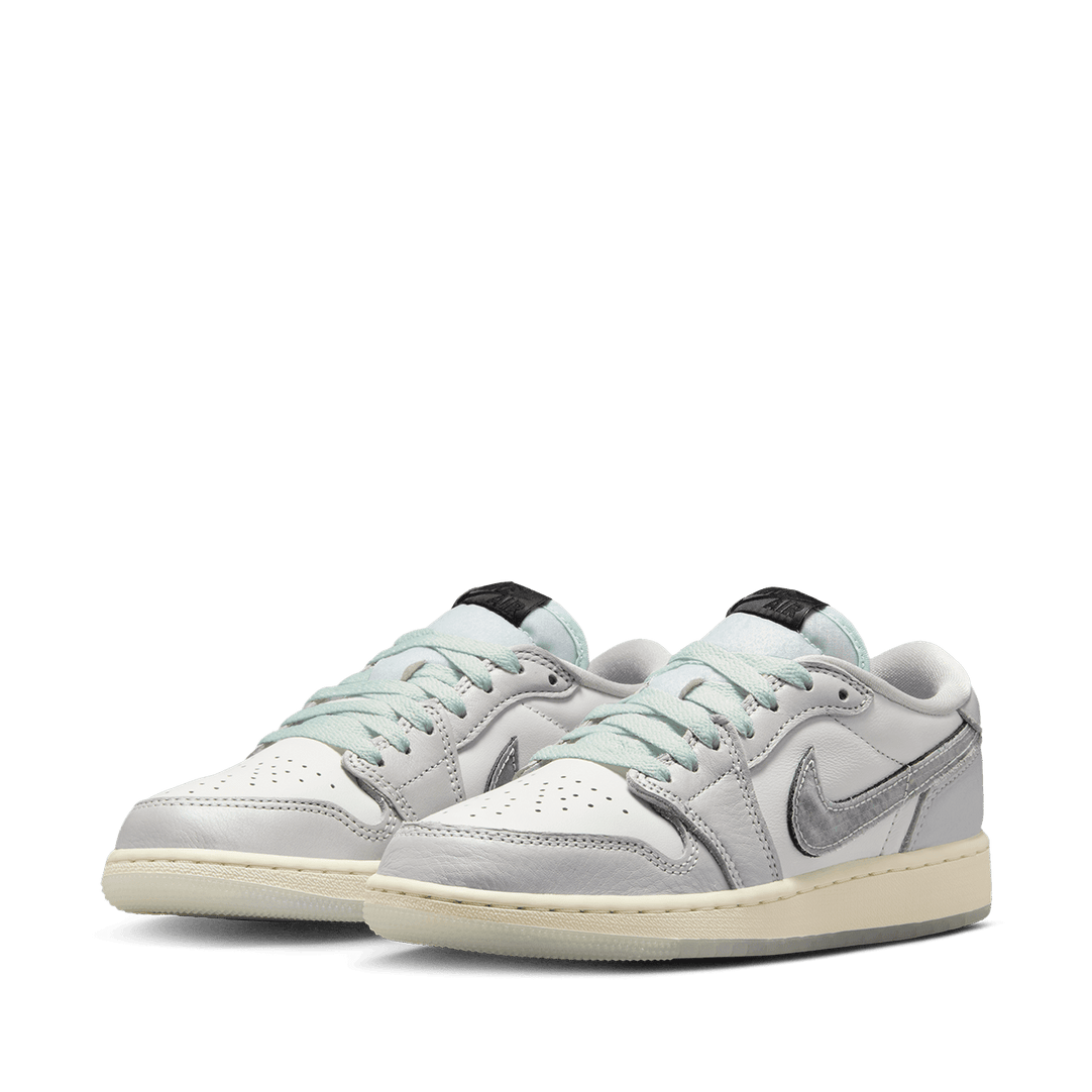 Air Jordan ‘Year of the Snake’ sneaker with reptilian-inspired textures, intricate patterns, and genuine leather for a luxe, commemorative design.