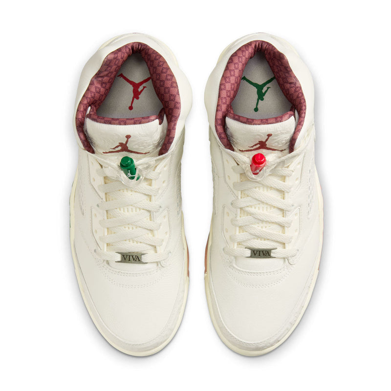 Exclusive AJ5 sneakers celebrating Mexico's heritage, featuring laser-cut leather, embossed patterns, asymmetrical midsole flames, off-white leather, and red and green lace locks, with a "VIVA" dubrae.


