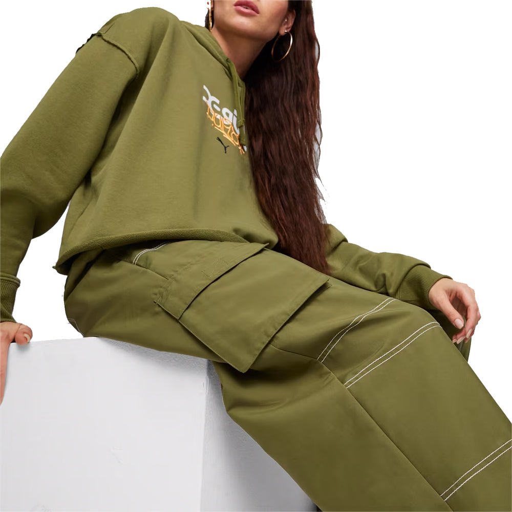 Front view of PUMA x X-GIRL Cargo Pants WV in black with utility pockets and co-branded detailing.