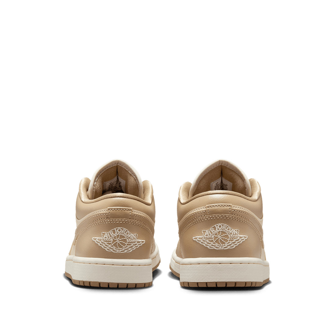 Air Jordan 1 Low sneaker with a premium material mix, iconic design, and encapsulated Air cushioning for all-day comfort.