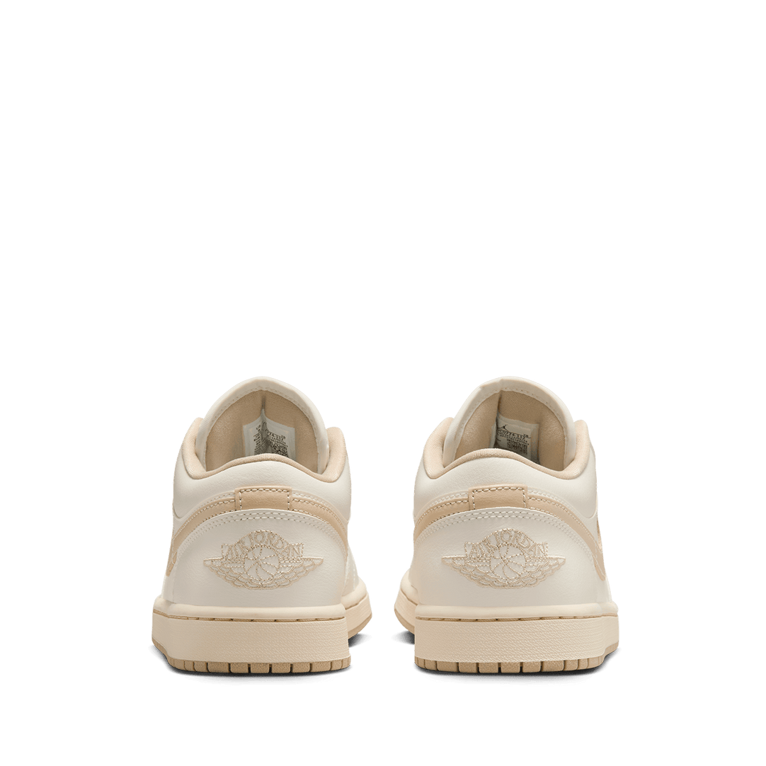 Air Jordan 1 Low sneakers featuring classic silhouette, premium materials, and encapsulated Air unit in the heel.