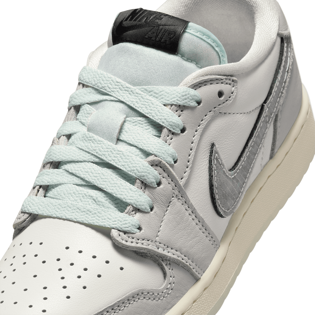 Air Jordan ‘Year of the Snake’ sneaker with reptilian-inspired textures, intricate patterns, and genuine leather for a luxe, commemorative design.