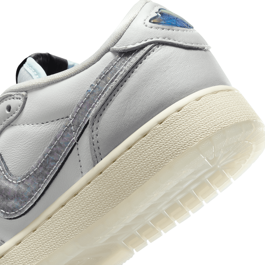 Air Jordan ‘Year of the Snake’ sneaker with reptilian-inspired textures, intricate patterns, and genuine leather for a luxe, commemorative design.