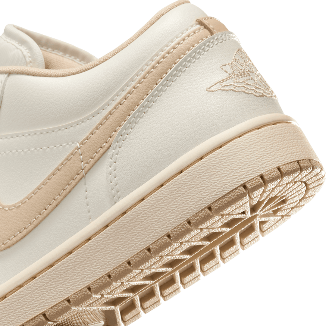 Air Jordan 1 Low sneakers featuring classic silhouette, premium materials, and encapsulated Air unit in the heel.