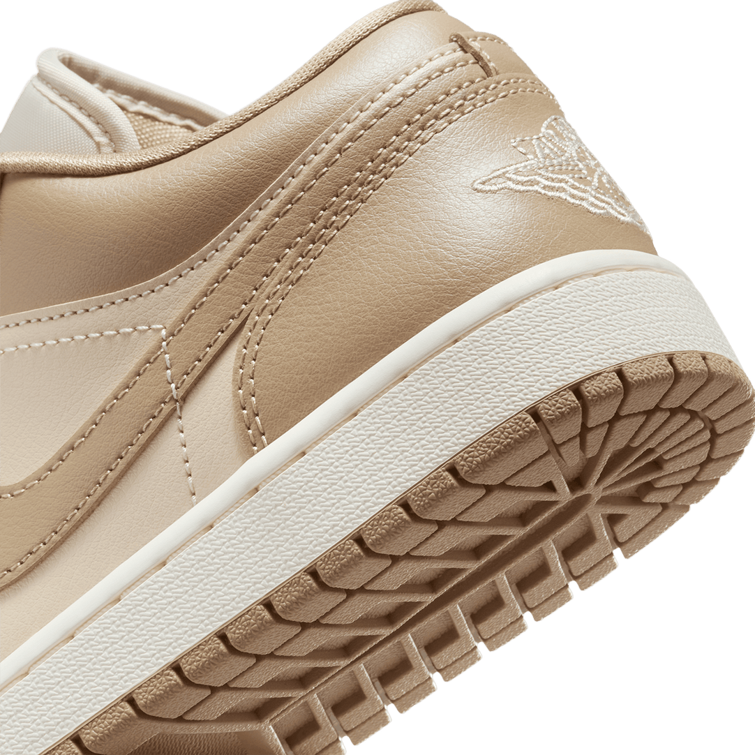 Air Jordan 1 Low sneaker with a premium material mix, iconic design, and encapsulated Air cushioning for all-day comfort.