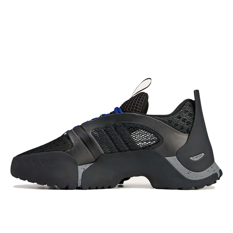ADIDAS Kouza DYZ sneaker with a futuristic silhouette and sculpted sole in a bold streetwear style.