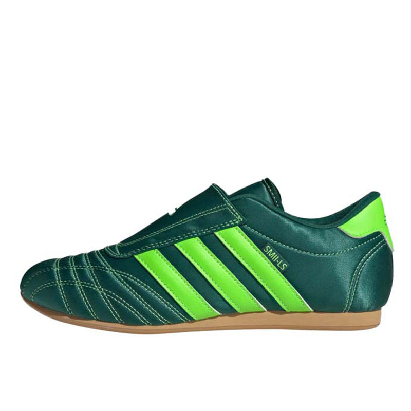 adidas slip-on shoes with smooth upper, curved stitching, and low-profile design inspired by 2000s Taekwondo trainers