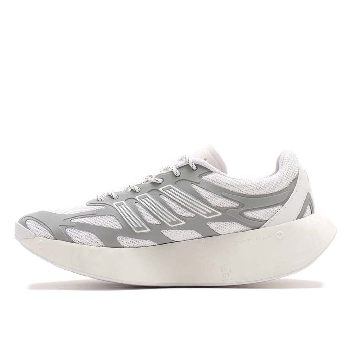 Adizero Arc shoes with Swirlfoam cushioning, a rocker-shaped sole, and a durable rubber outsole, inspired by 2000s running sneakers.