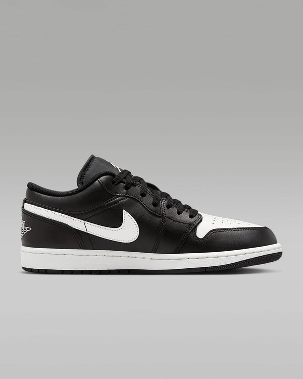Air Jordan 1 Low sneakers in classic colorway, side profile view.