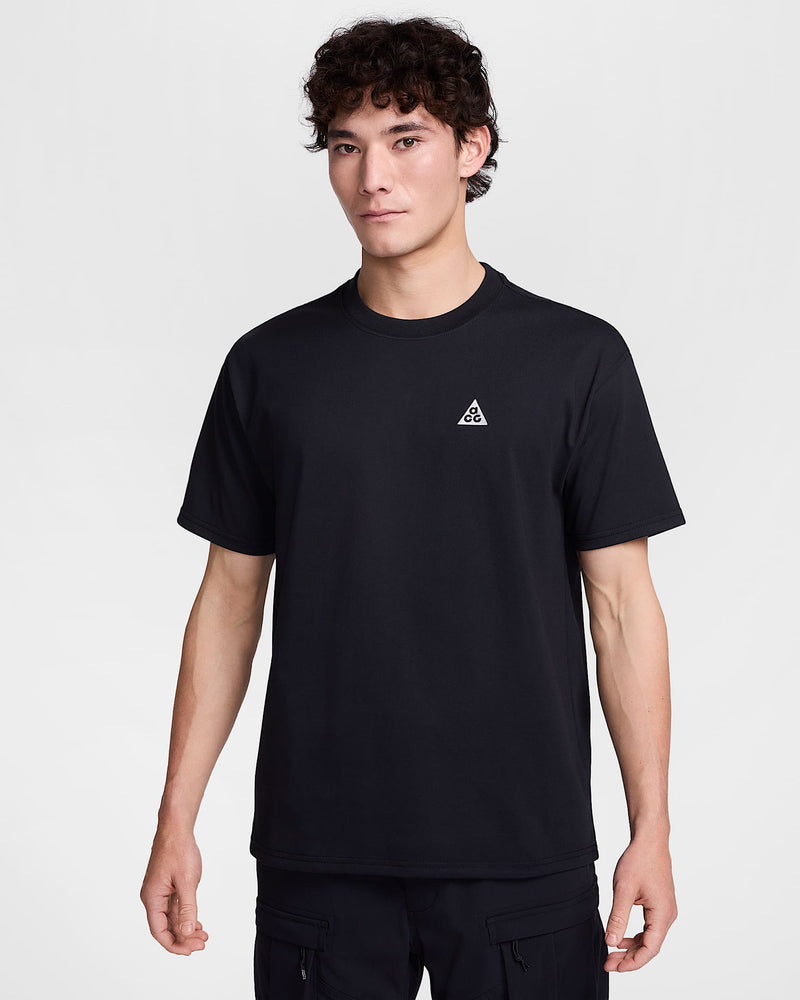 Premium loose-fit tee made from heavyweight sweat-wicking fabric with a stiff drape and structured feel.