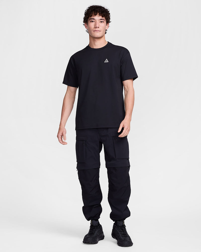 Premium loose-fit tee made from heavyweight sweat-wicking fabric with a stiff drape and structured feel.