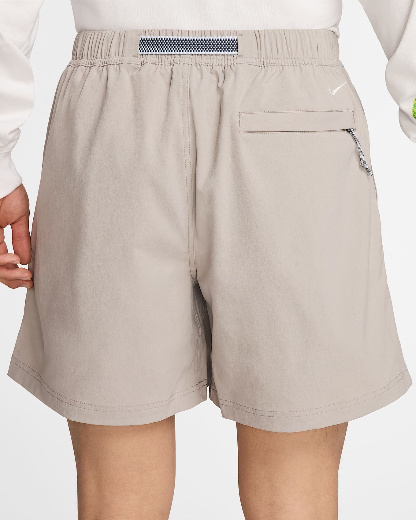 Nike ACG hiking shorts with a sweat-wicking, water-repellent design, roomy fit, and mobility gusset for comfort on and off the trail.
