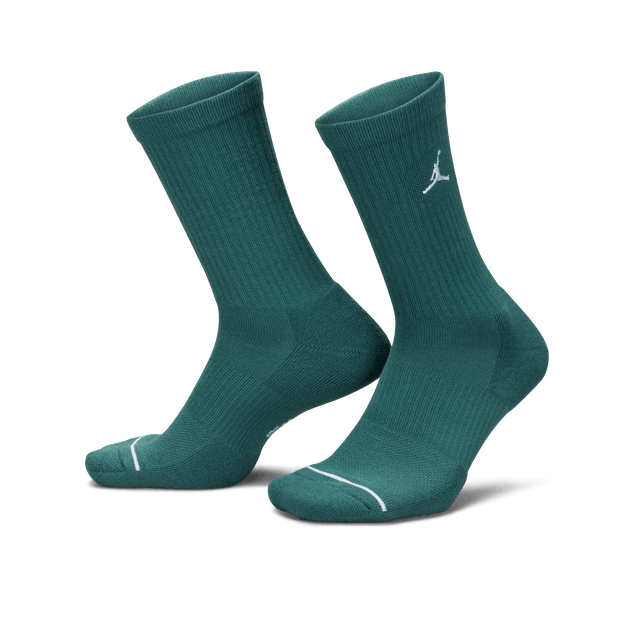 Comfortable socks with sweat-wicking technology, arch support, cushioning, breathable knit pattern, and reinforced heel and toe. 