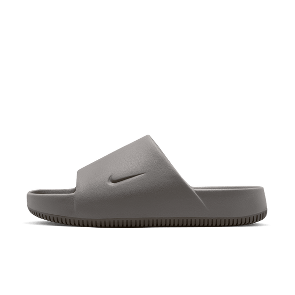 Lightweight foam slides with a contoured, seamless design, subtle textured footbed, and water-friendly outer shell. Ideal for both beach and city wear, featuring a rubber outsole for excellent traction.



