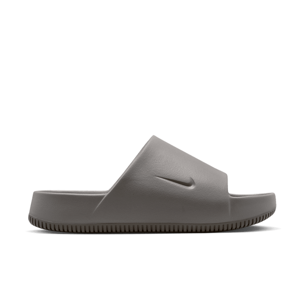 Lightweight foam slides with a contoured, seamless design, subtle textured footbed, and water-friendly outer shell. Ideal for both beach and city wear, featuring a rubber outsole for excellent traction.



